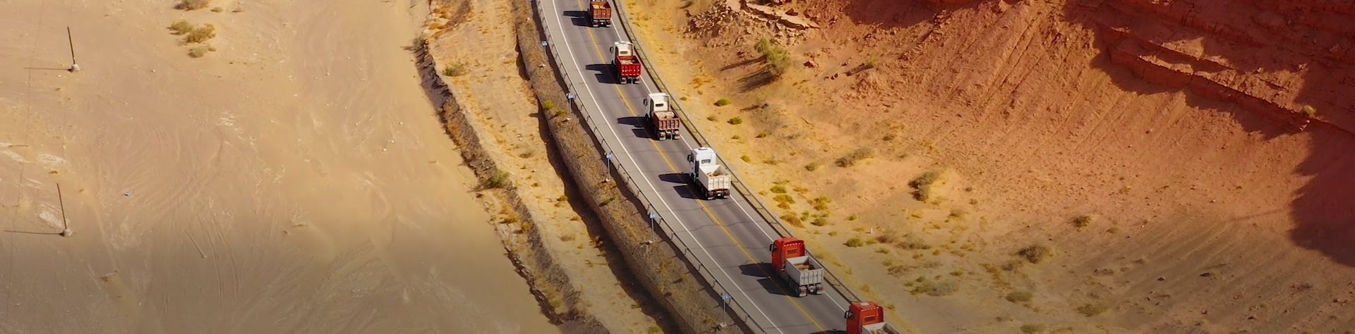 Commercial trucks at a production facility